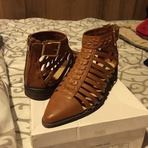 Brown pointed cutout booties