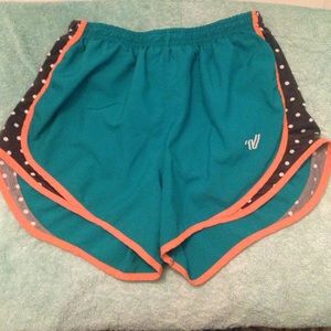 Varsity Brand Teel, Orange, Black, and White short