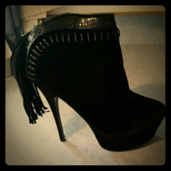 Black booties with stiletto heels