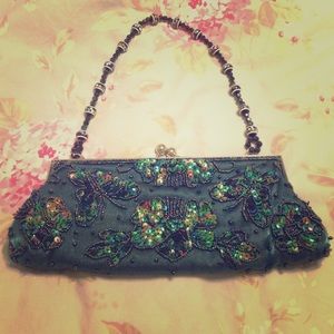 Green sequin clutch