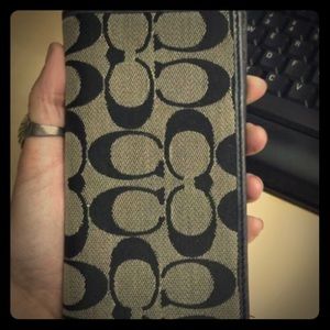 Coach check book cover