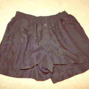Black cinched shorts with buttons