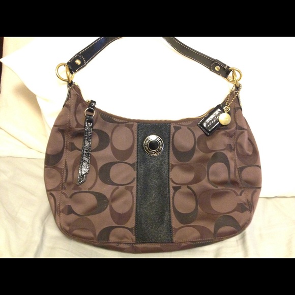 Brown and black Coach shoulder bag