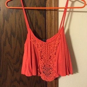 salmon colored crop top