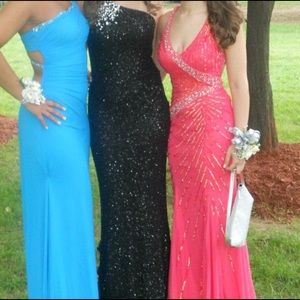 Stunning coral colored prom dress!