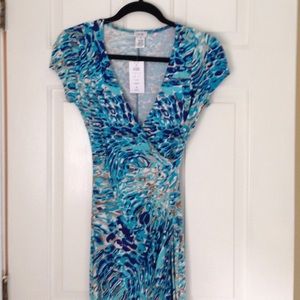 New with tags. Cache rayon and spandex dress.