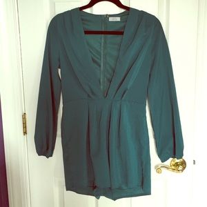 Teal Tobi Romper. Low v-cut in the front.