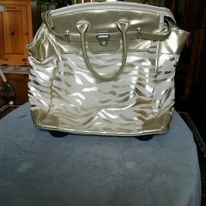 Gold roll on luggage