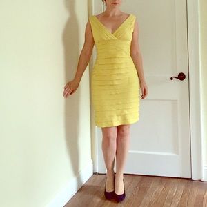 Beautiful sunyellow peplum dress by Adriana Papell