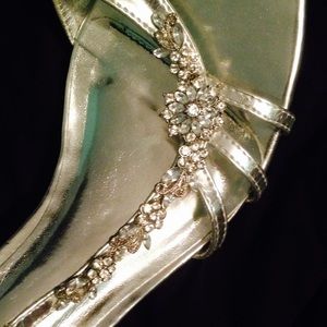 Silver shoes embellished with small heel