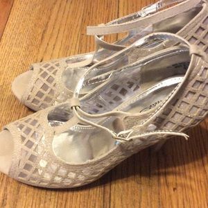 Tan and silver ankle strap heels