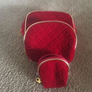 Red pouch and makeup bag.