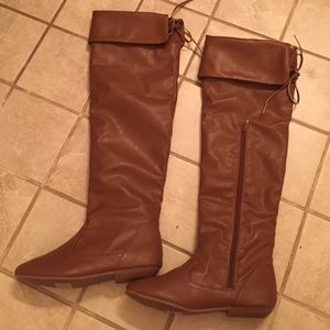 Never been worn knee high boots