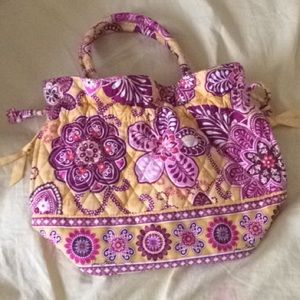 Yellow and dark pink Vera Bradley purse.