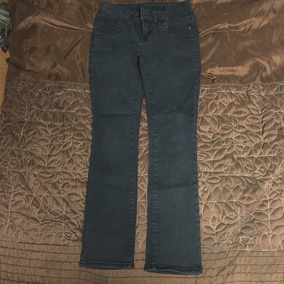 Delia's faded black jean.