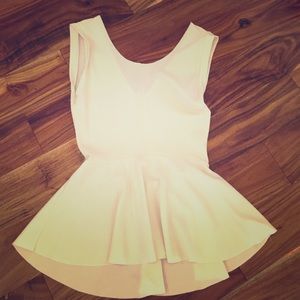 White flouncy peplum top