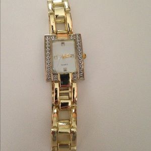 Gold colored watch