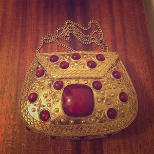 From St Xavier side body purse