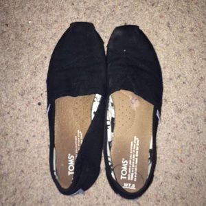 gently worn black toms