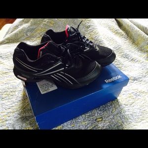 Black and pink reebok Easytone sneakers.