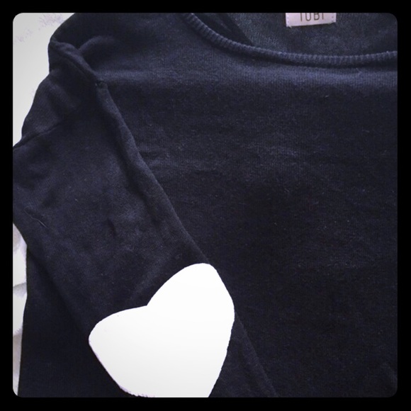 Black sweater w/ white heart-shaped elbow patches