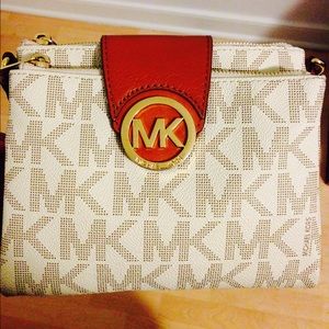 AUTHENTIC Michael Kors cross-body bag.