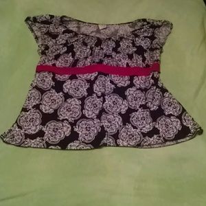 Black and white with red tie back blouse