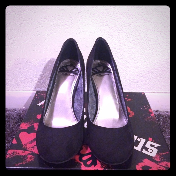 Black Fergalicious wedge heels