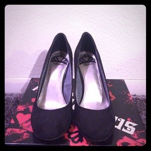 Black Fergalicious wedge heels