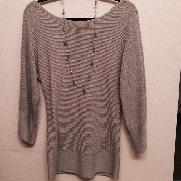 A light gray sweater very soft and comfortable