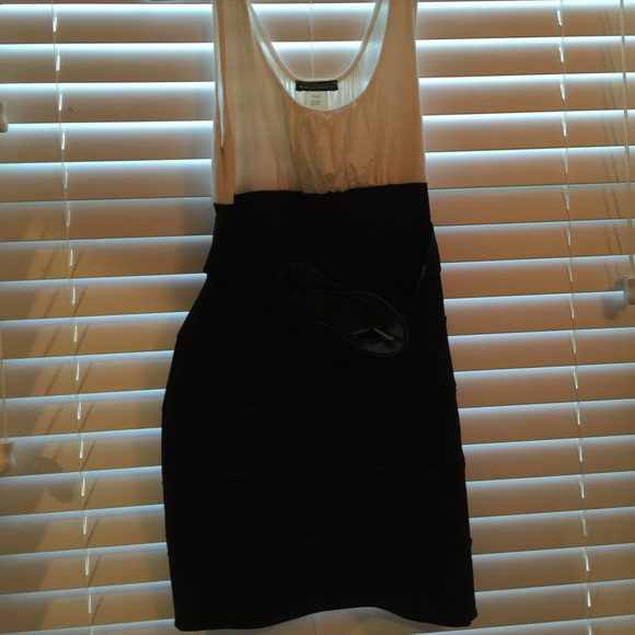 Black and white bodycon with a belt. LARGE