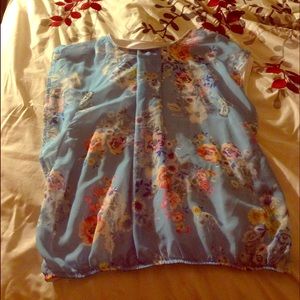 Floral on blue shirt from LC WAIKIKI