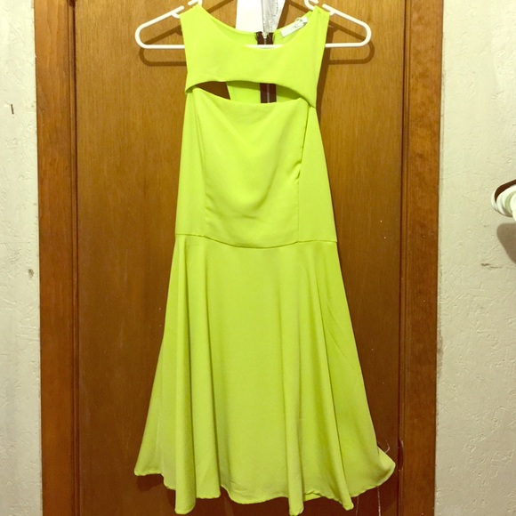 Neon green dress with cut out at chest