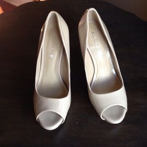 ALDO nude peep toe pumps