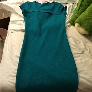 Dress with opening on the front