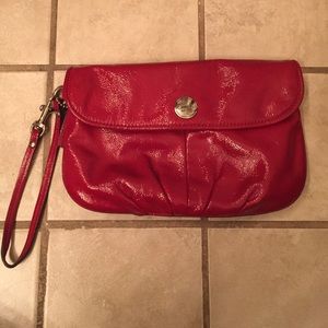 Authentic coach wristlet/clutch