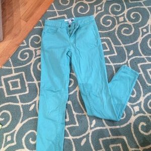 Teal jeans. Very summery with sandals and a tank!