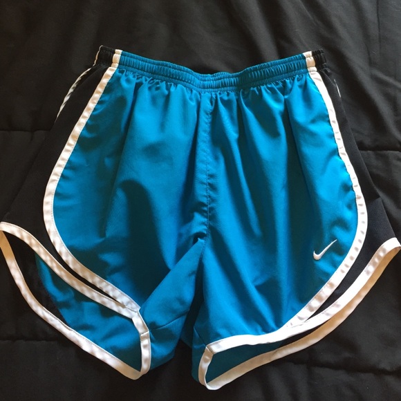 Teal and black women's Nike tempo running shorts.