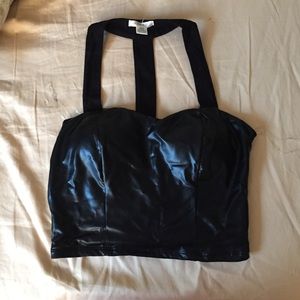 Black faux leather crop top.