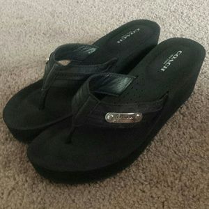 Black wedge Coach flip flops