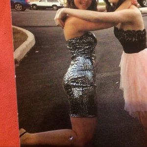 Body fitted black and silver sequin dress