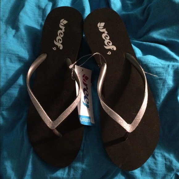 Black and silver heeled flip flop sandals