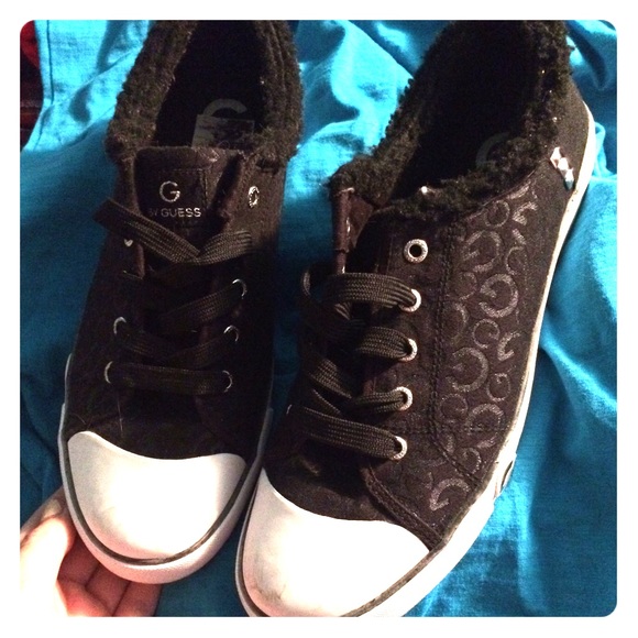 Black low top studded sneakers