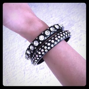 Two black bangles with stones