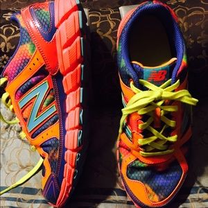 New Balance multi-colored tennis shoes.