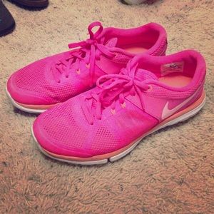 Pink nike rubbing shoes