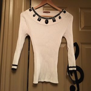 White sweater with beads