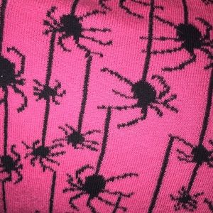 Pink and black sweater with spider design