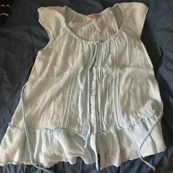 Button up T-shirt, also ties in the back