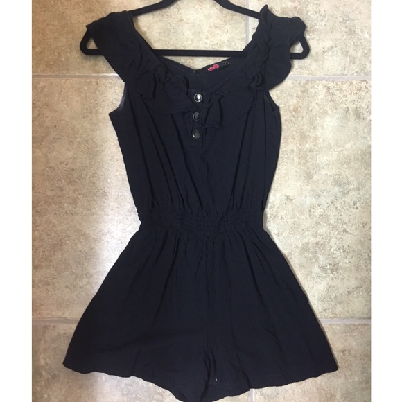 Black romper with frilly sleeves